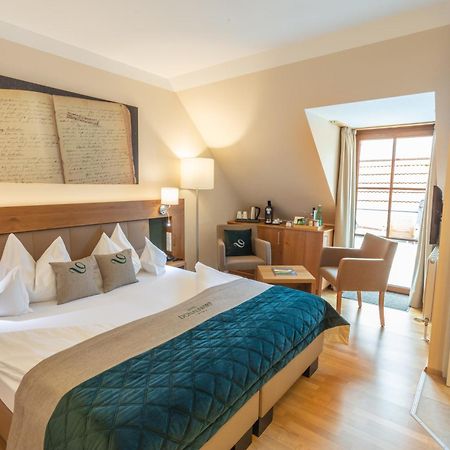 Donauwirt - Hotel Garni ไวส์เซินเคียร์เชิน อินแดร์ วาคเอา ภายนอก รูปภาพ