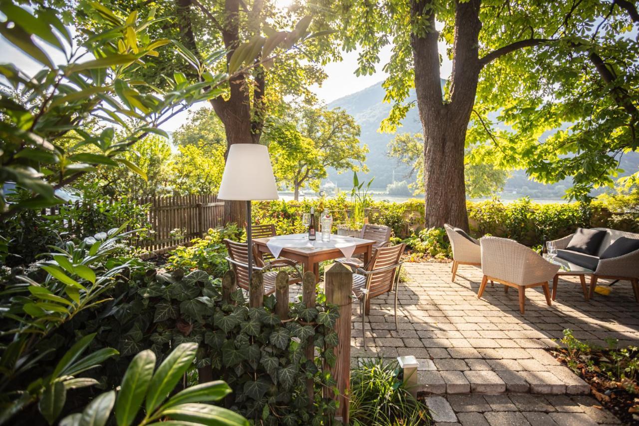 Donauwirt - Hotel Garni ไวส์เซินเคียร์เชิน อินแดร์ วาคเอา ภายนอก รูปภาพ